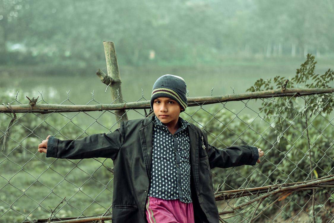 A boy wearing winter clothes