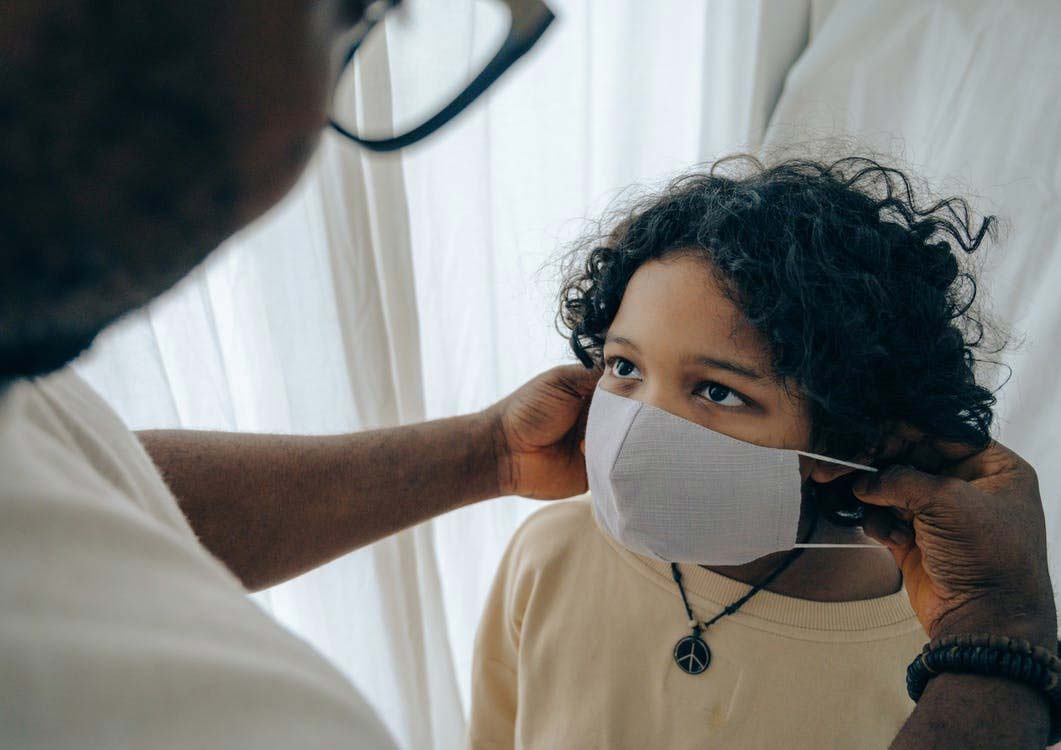 A girl wearing a mask